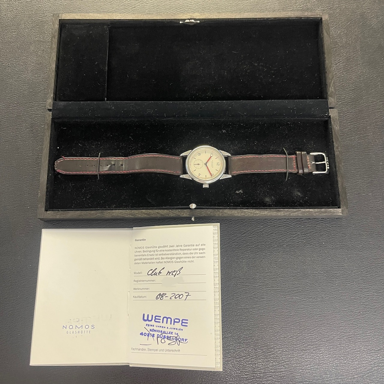Gebrauchte Luxusuhr – Originalbox, Originalpapiere und Garantiekarte