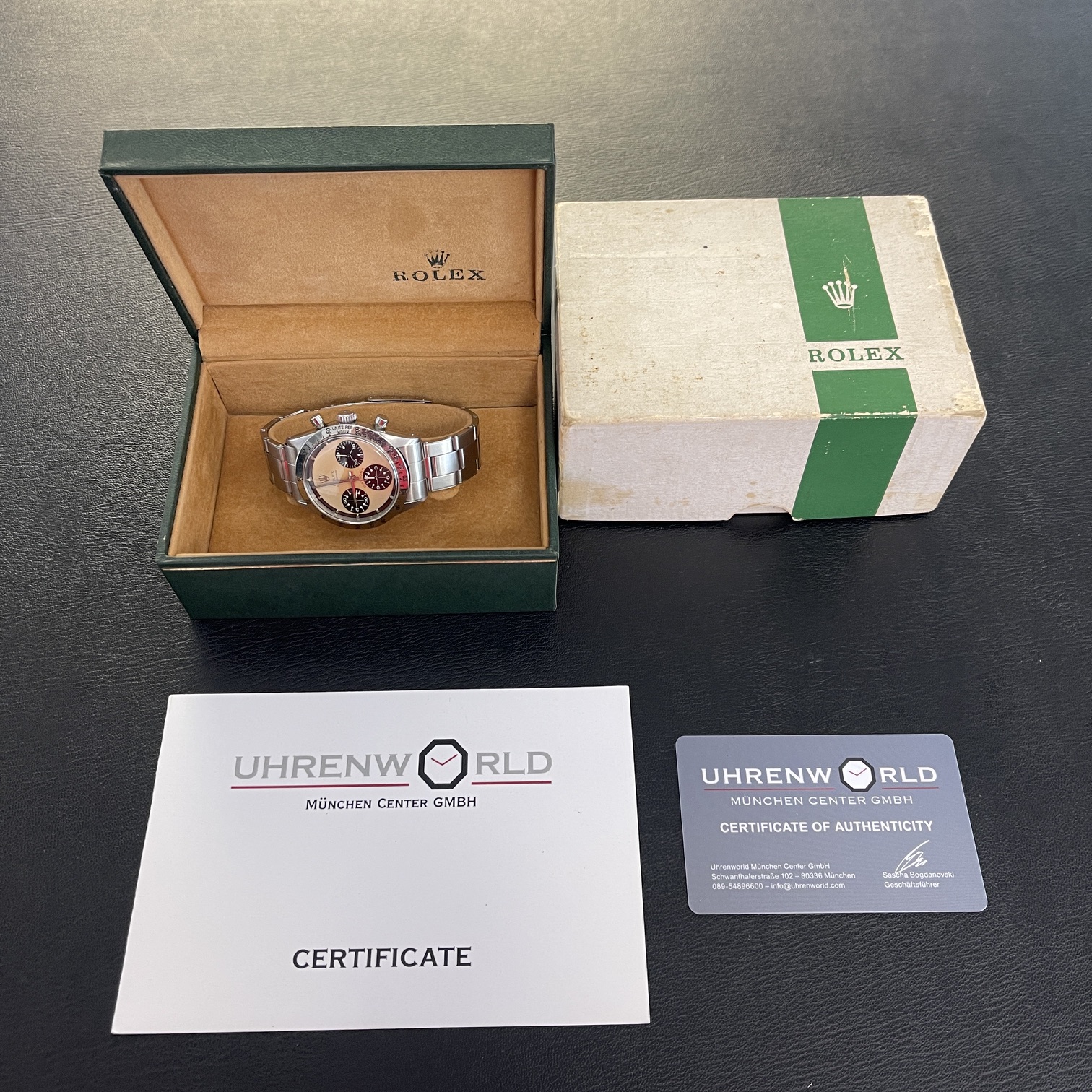 Rolex Box und Uhrenworld Echtheitszertifikat für eine geprüfte gebrauchte Rolex Daytona Paul Newman Ref. 6239