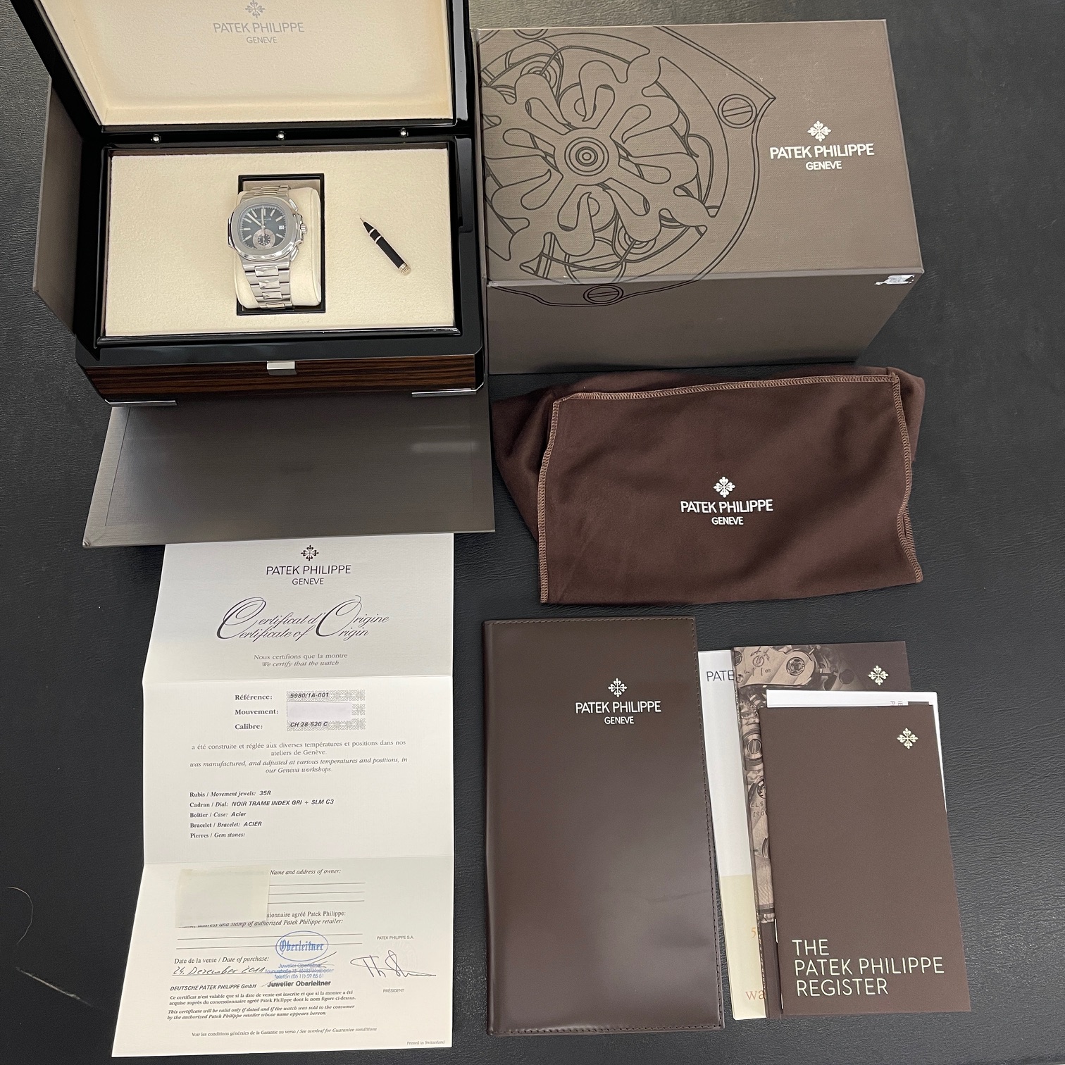 Patek Philippe - Nautilus Chronograph - FULLSET 2011 deutsch - Ref. 5980/1A-001