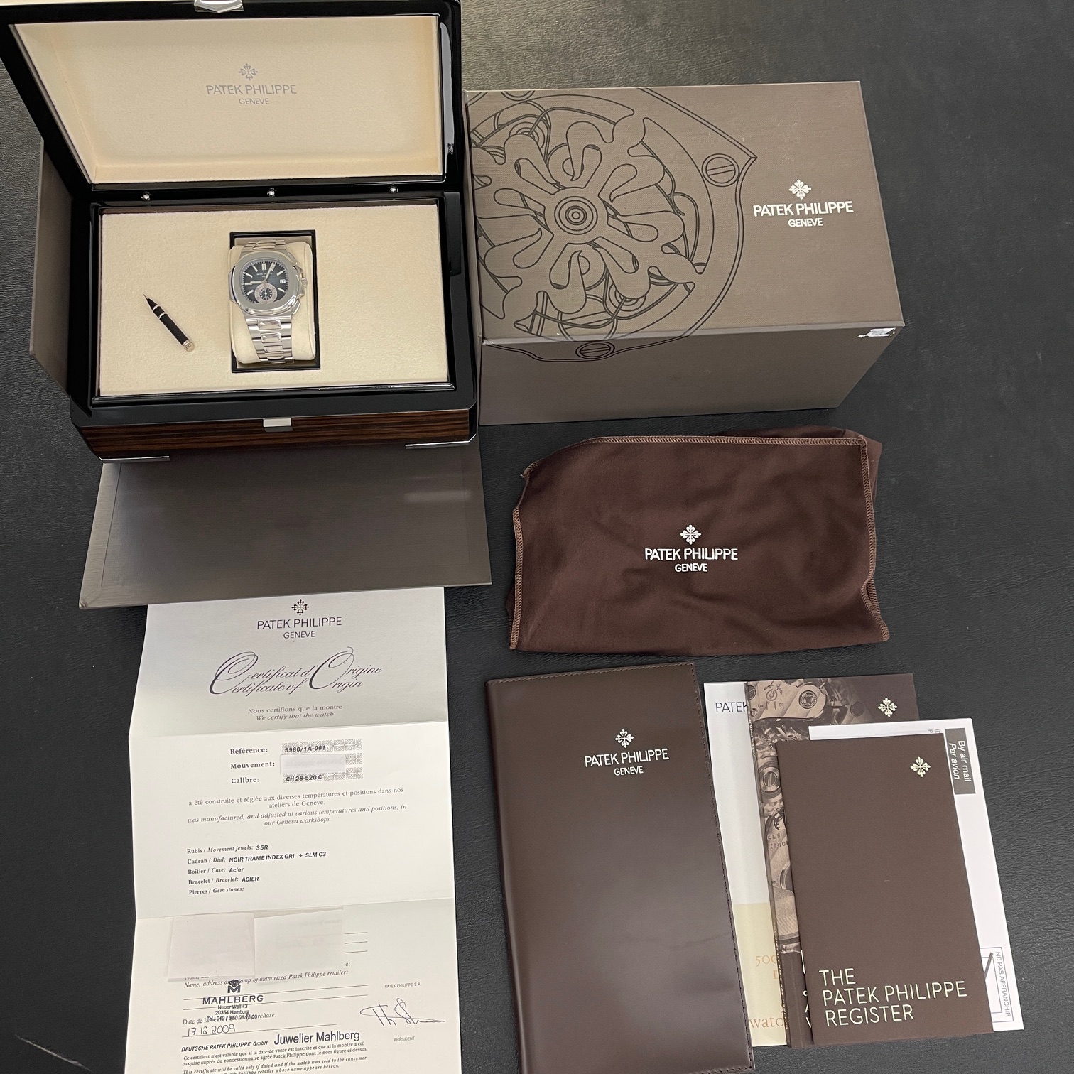Patek Philippe - Nautilus Chronograph - FULLSET 2009 deutsch - Ref. 5980/1A-001